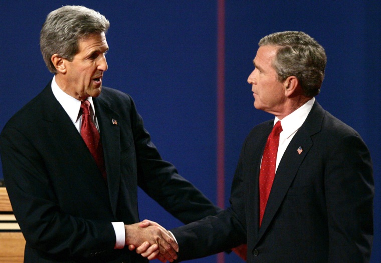 Their unsmiling faces reflecting the tenor of the debate, Sen. John Kerry, D-Mass., and President Bush shake hands after their meeting Wednesday night.