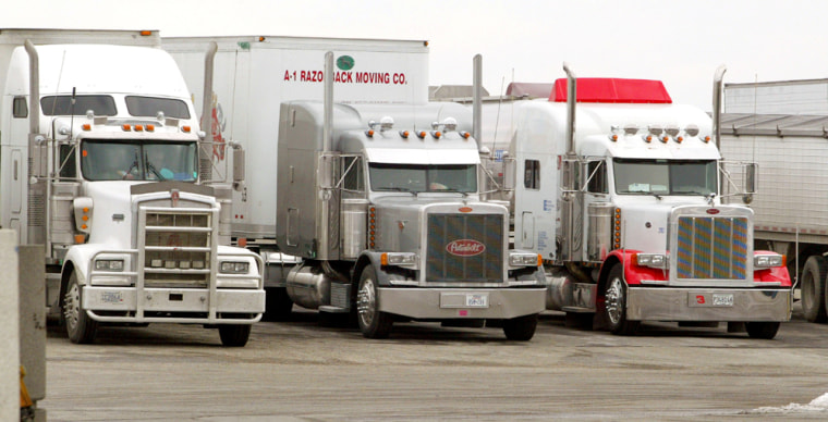 Executives and analysts for the freight industry said truck drivers' wages would have to increase from the current annual $40,000-$58,000 range to more than $60,000 if road freight carriers were to successfully compete for workers in a growing labor market. 