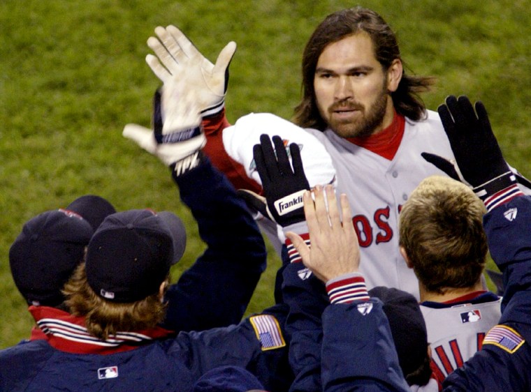 Red Sox Damon congratulated on second home run in Game 7 of the ALCS against Yankees