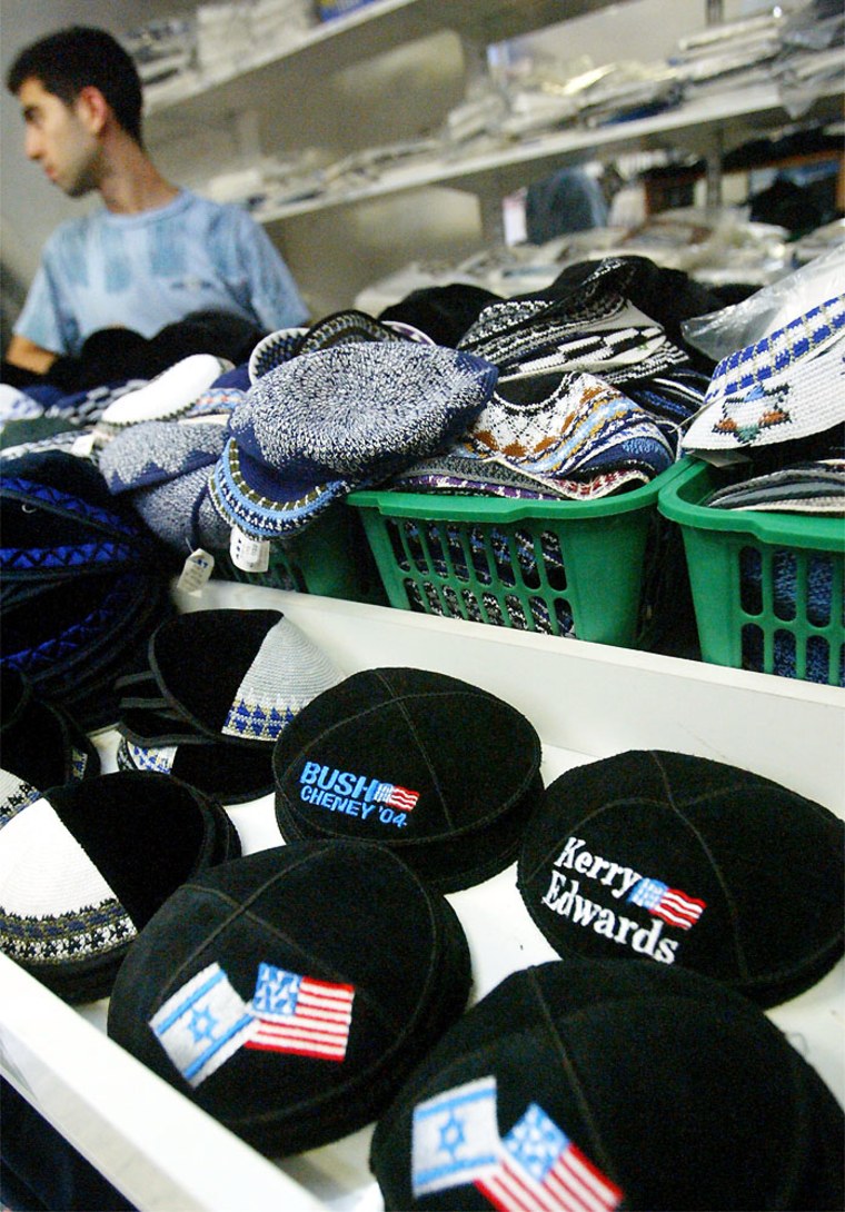 A display of yarmulkes at a store in the ultra-orthodox Jewish neighborhood of Mea Shearim in Jerusalem offers versions with the names of the U.S. presidential candidates.