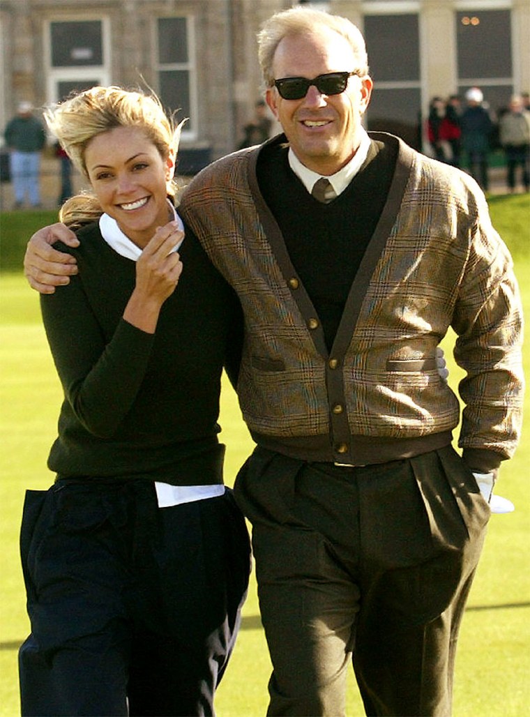 Actor Costner walks with wife Christine during practice round for Dunhill Links Championship in Scotland