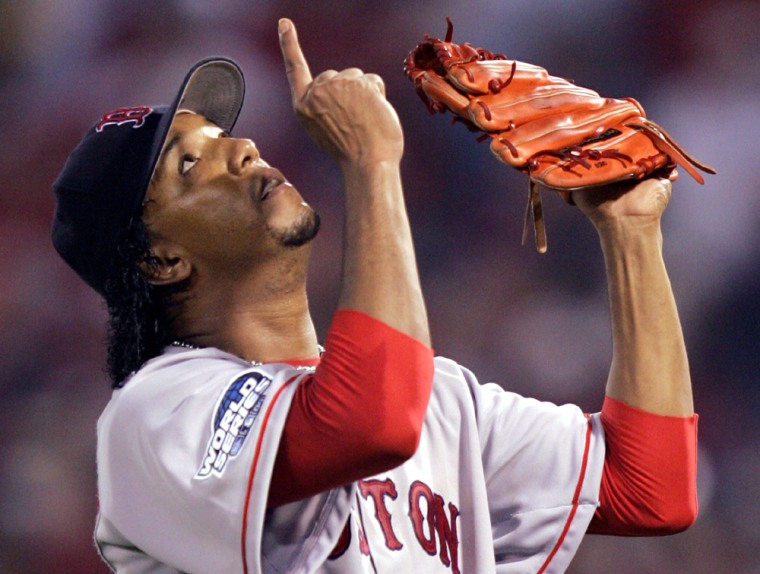 Red Sox pitcher Martinez celebrates during win over Cardinals in Game 3 of World Series