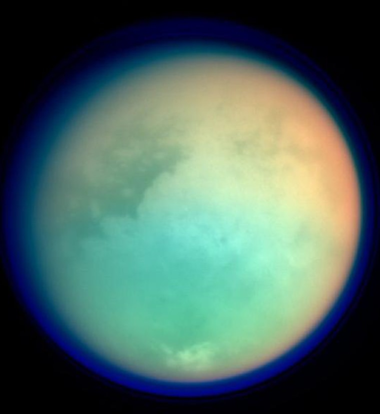 This color-coded picture, constructed from Cassini imagery acquired through different filters, shows Titan in ultraviolet and infrared wavelengths. Red and green colors represent infrared wavelengths and show areas where atmospheric methane absorbs light. These colors reveal a brighter (redder) northern hemisphere. Blue represents ultraviolet wavelengths and shows the high atmosphere and detached hazes.
