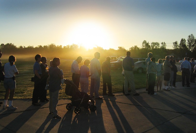 Voters wait in line as the sun comes up in Lakeland Florida