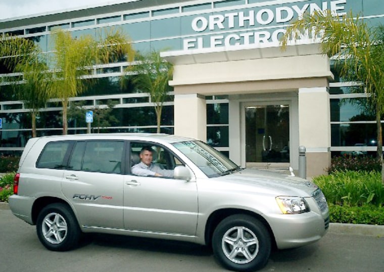 Gregg Kelly, CEO of Orthodyne Electronics, has been commuting with this fuel cell Toyota Highlander for nearly two years. The test SUV has right-hand drive, which Kelly says took him a week or so to get used to.