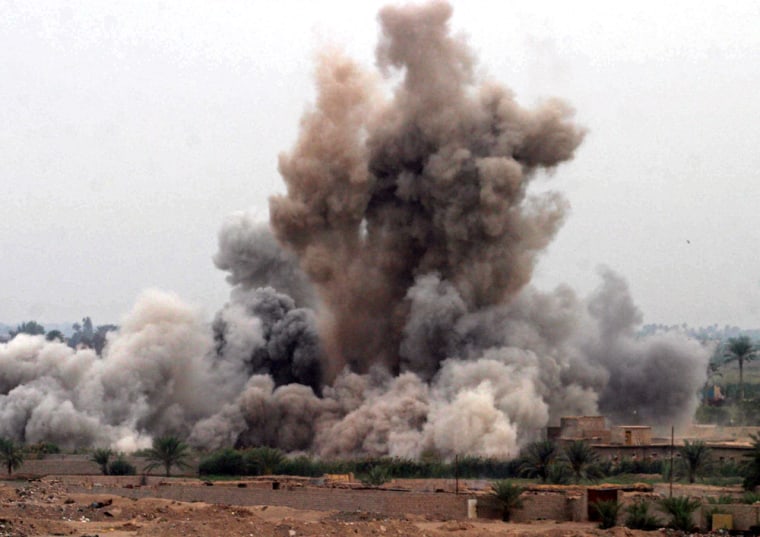 Air strike is called in on a suspected insurgent hideout at the edge of Falluja