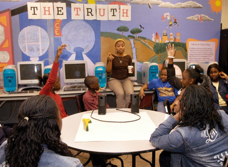 Tene Howard, TRUCE program coordinator, center, leads a gathering of the Umoja Media Project at the TRUCE center in New York City's Harlem neighborhood on Monday, Nov. 22, 2004. (Photo by David Friedman / MSNBC.com)