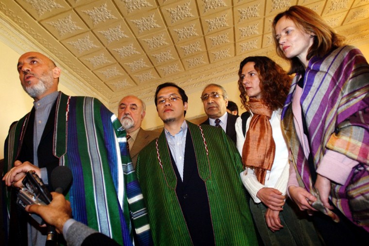 Freed U N workers visit Afghan president