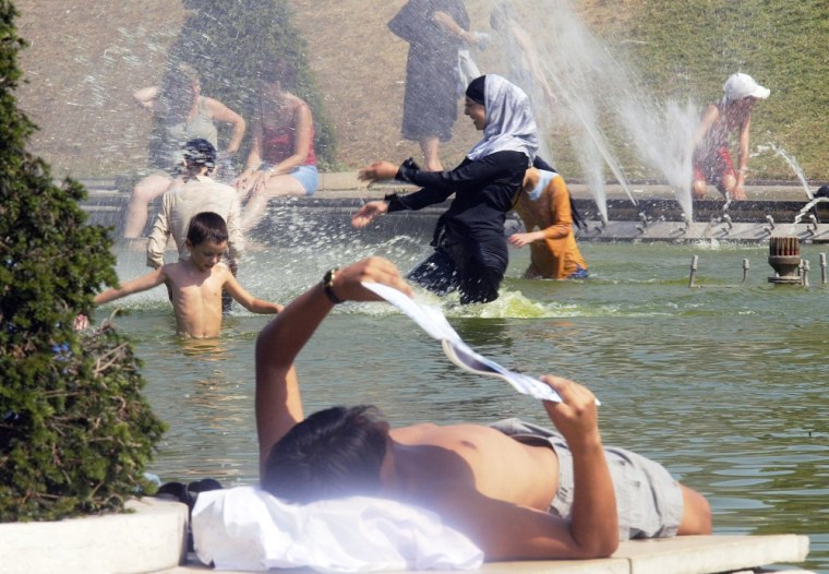 Europe's 2003 heat wave sent people looking for places to cool off, including the Trocadero fountains in Paris, seen here on Aug. 12.