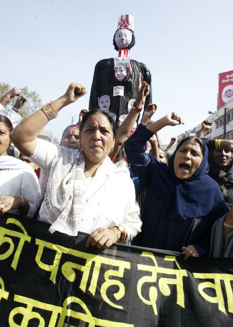 Victims of the 1984 Bhopal gas tragedy shout slogans in Bhopal