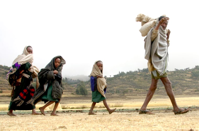 An Ethiopian family walks near Korom northeast Ethiopia