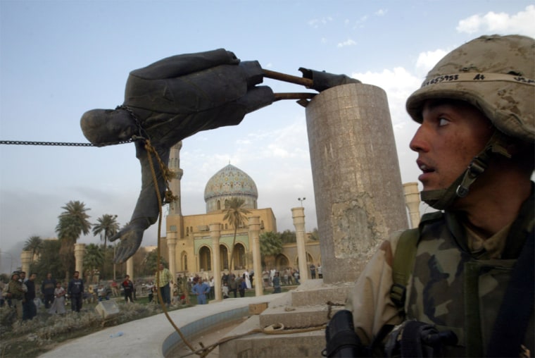 FILE PHOTO OF TOPPLING OF STATUE OF PRESIDENT SADDAM HUSSEIN FALL IN CENTRAL BAGHDAD