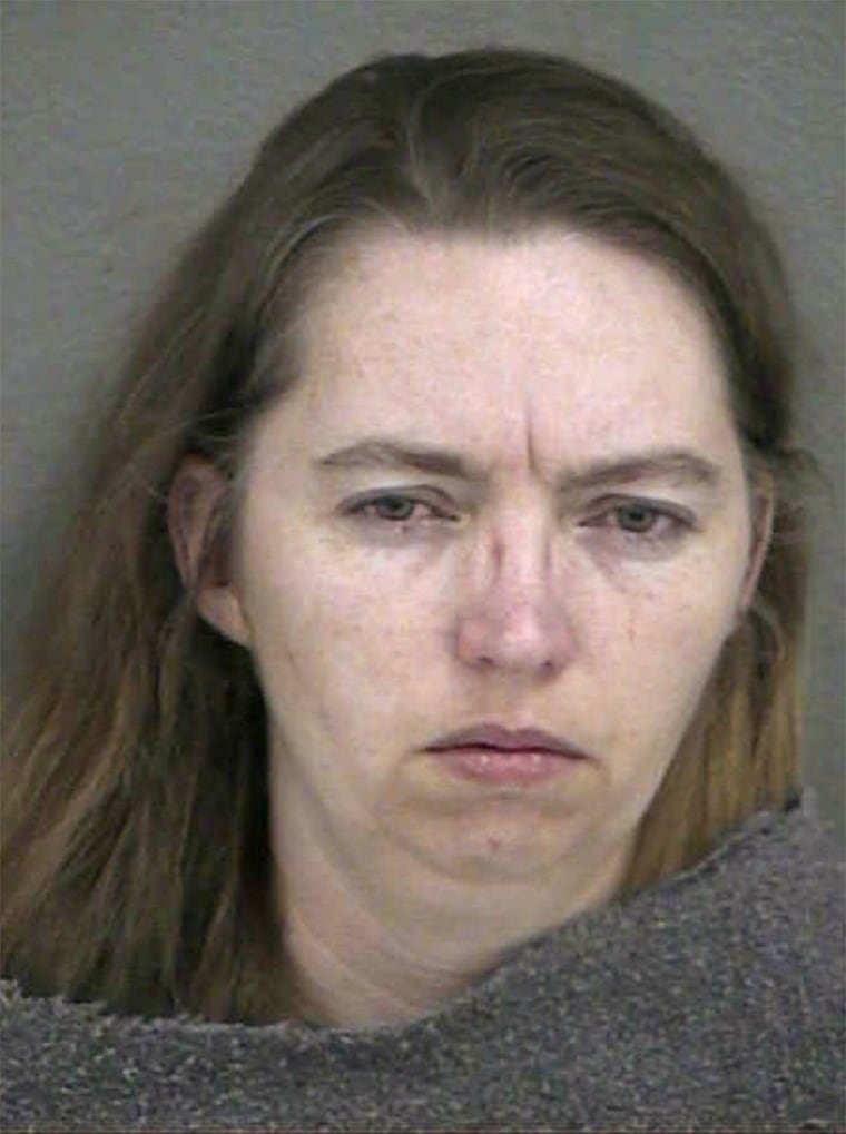 Police booking photo shows Kansas woman charged with murdering pregnant woman and stealing baby
