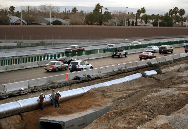 Grading and drainage work has begun on the project to widen Interstate 95 through Las Vegas, but paving has been blocked in a pending lawsuit.
