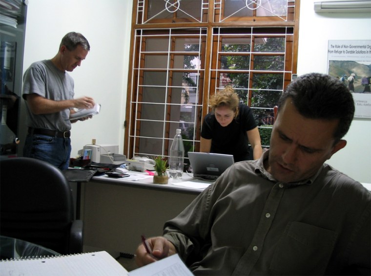 Richard Brennan, in foreground, with Franklin Broadhurst, at left, and Gillian Dunn of the International Rescue Committee.
