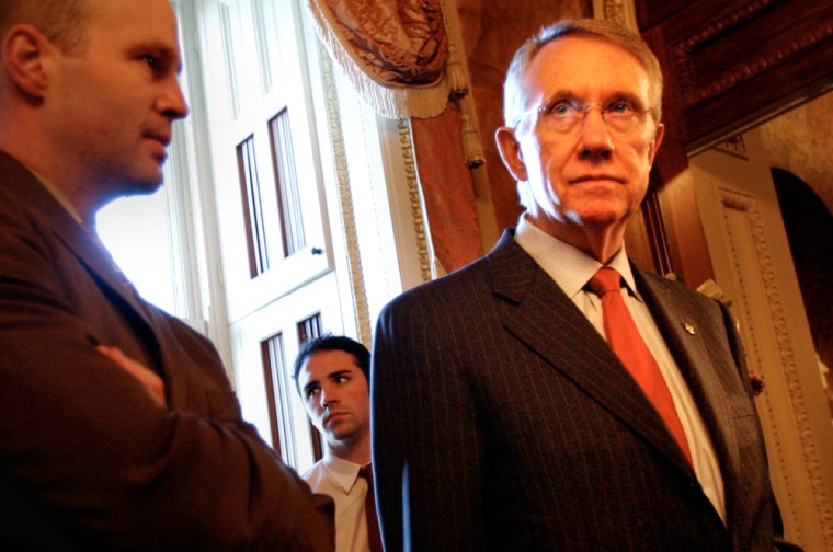 Senate Minority Leader Harry M. Reid, right, accuses the Bush administration of manufacturing "crises" to suit its own political ends.