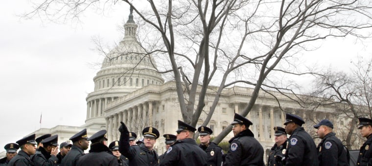 A group of U.S. Capitol police get instructions during an inauguration rehearsal Sunday.