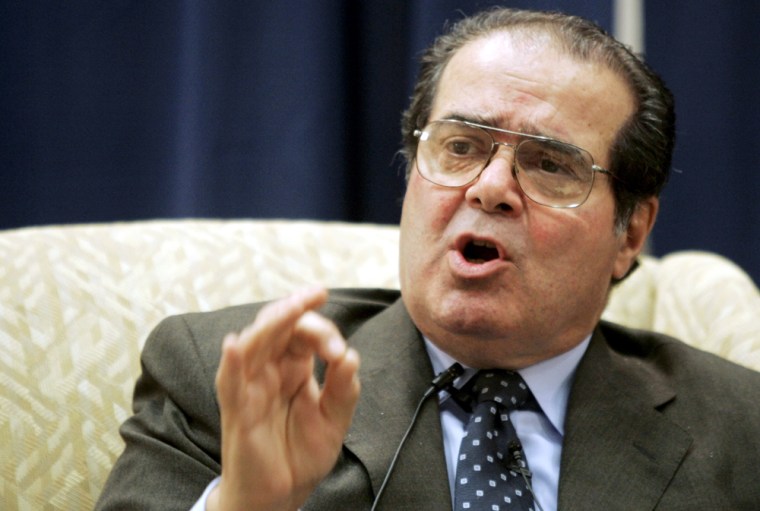 Justice Antonin Scalia makes a point during his joint appearance with fellow Justice Stephen Bryer on Thursday in Washington.