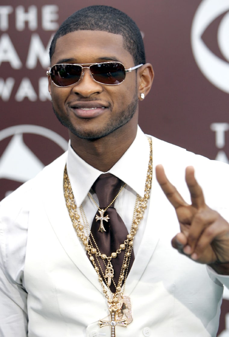 Usher arrives at the 47th annual Grammy Awards