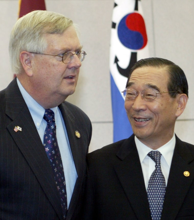 South Korea's Defence Minister Yoon greets U.S. Republican Weldon in Seoul