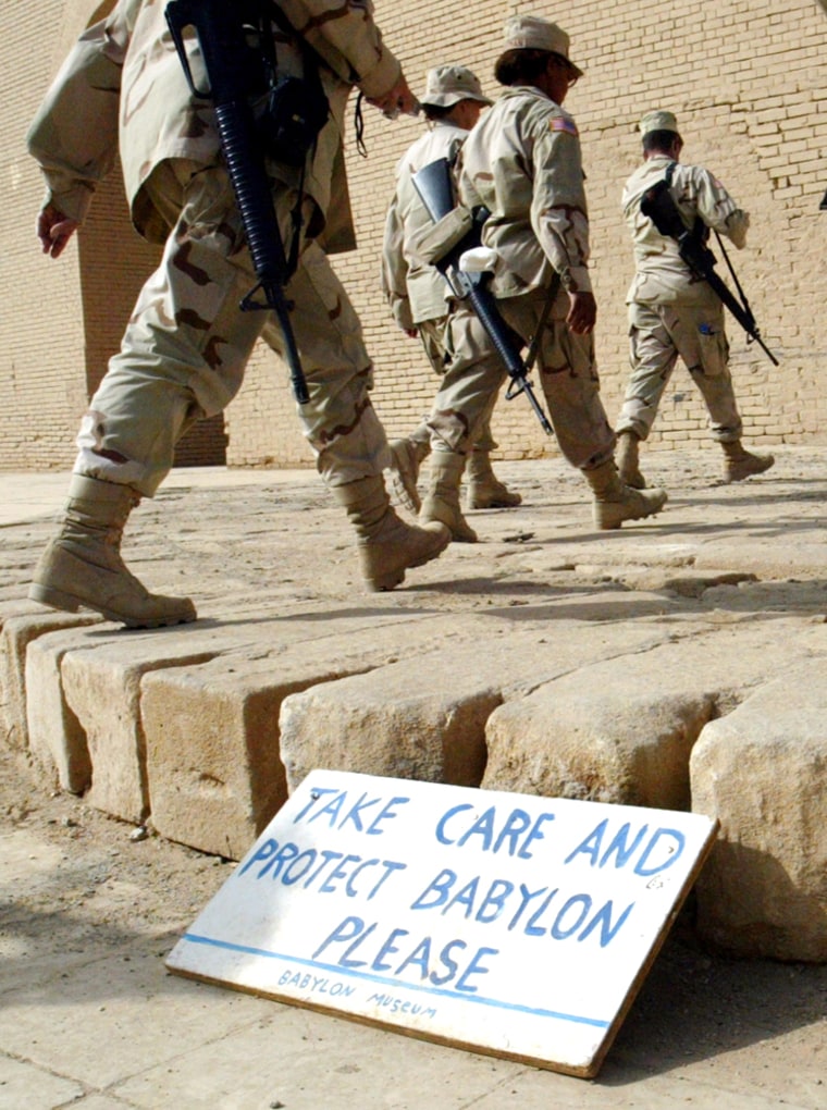 U.S. Army soldiers tour through the rebuilt ruins of 4,000-year-old Babylon, Iraq, on Oct. 20, 2004.