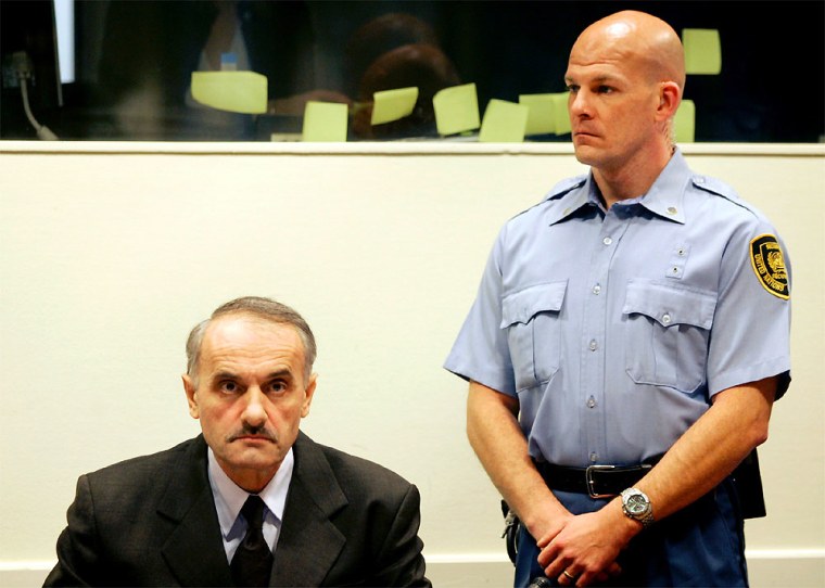 Former Bosnian Serb army commander Vidoje Blagojevic waits in the courtroom in The Hague