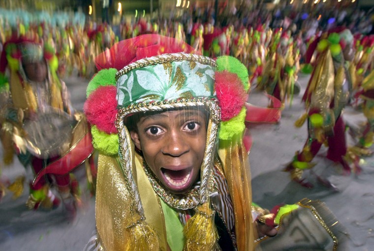 A child dances with the Unidos de Viradouro samba school during last year's Carnival.