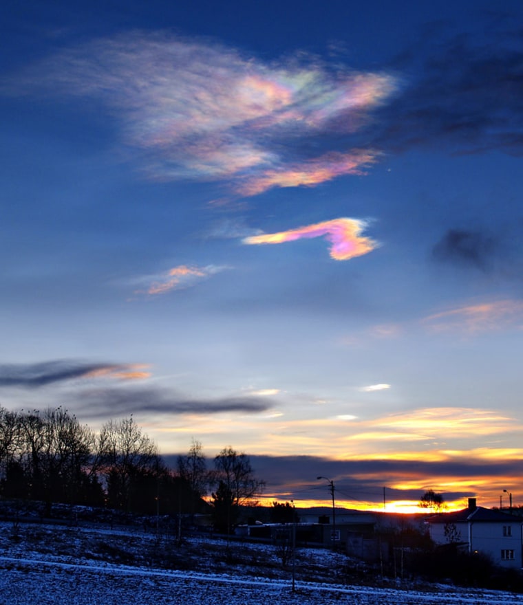 Mother of pearl clouds observed over Southern Norway at sunrise on 5th January 2005. They consist of ice particles and typically form when meteorological conditions cause local cold spots in the stratosphere. In this case they were formed in the so-called