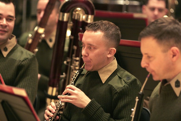 Musician transitions to a different outfit