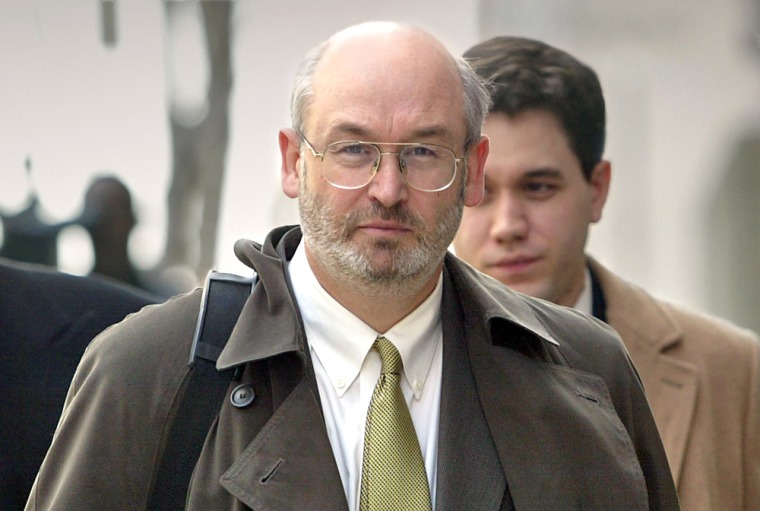 Ken Matzdorff (center) and members of his defense team left the federal courthouse Tuesday afternoon, Jan. 18, 2005.  01182005  KEITH MYERS/The Kansas City Star

*****HEAD SHOT FROM THIS PICTURE RAN ON A1 THE SAME DAY*****

CUTLINE Kenneth Matzdorff (center) and his defense team left the federal courthouse in Kansas City after his guilty plea Tuesday. He is president of Cass County Telephone col in Peculiar. KEITH MYERS/THE KANSAS CITY STAR