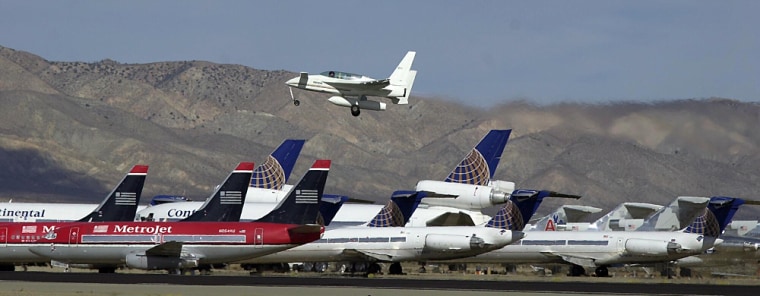 XCOR's EZ-Rocket aircraft takes flight over the Mojave airport in this image from 2001. XCOR is one of several space startups trying to develop private-sector space travel.