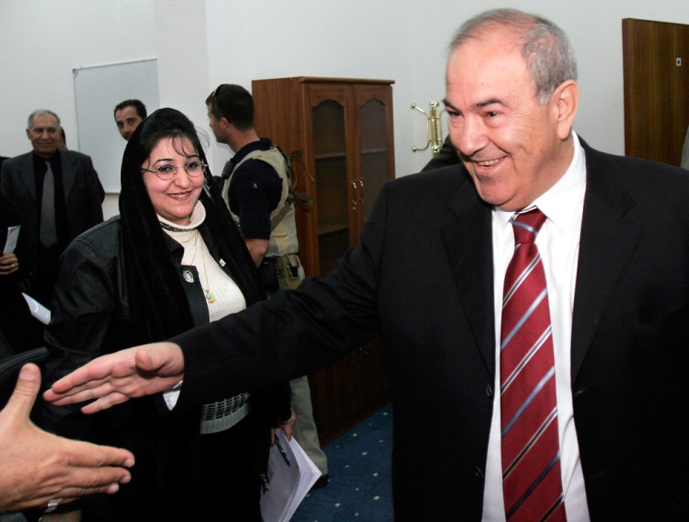 Iraqi interim Prime Minister Allawi greets supporters in Baghdad