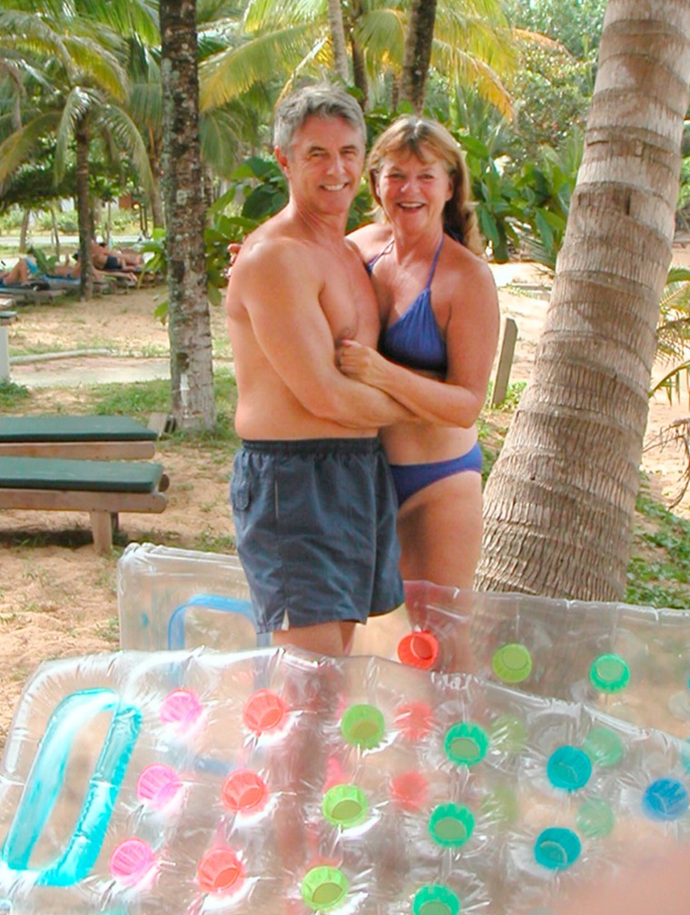 John and Jackie Knill pose at their Thailand resort in Khao Lak on Dec. 12, 2004, taken the couple's digital camera, in this family handout photo. The bodies of the two tsunami victims have been found in Thailand, along with their final photos. (AP PHOTO/ Knill Family)