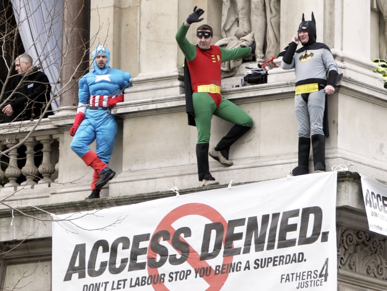 Members of Fathers 4 Justice climbed onto a ledge at Britain's Foreign Office on Monday, dressed as Captain America, Robin and Batman.