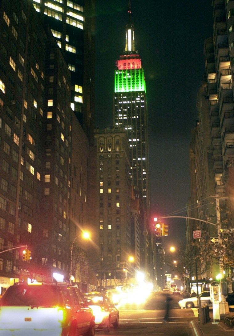 The Empire State Building is lit red and green in honor of St. David's Day, Friday, Feb. 28, 2003 in New York. Legend has it that in the 6th century, St. David encouraged the Welsh to wear leeks in their caps to distinguish themselves in battle with the Saxons. After conquering the Saxons, they wore leeks every March 1st for the anniversary of the victory. (AP Photo/Ed Bailey)