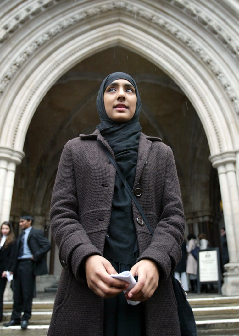 Bangladeshi Muslim schoolgirl Begum leaves court in London after winning the right to wear full Islamic dress at school