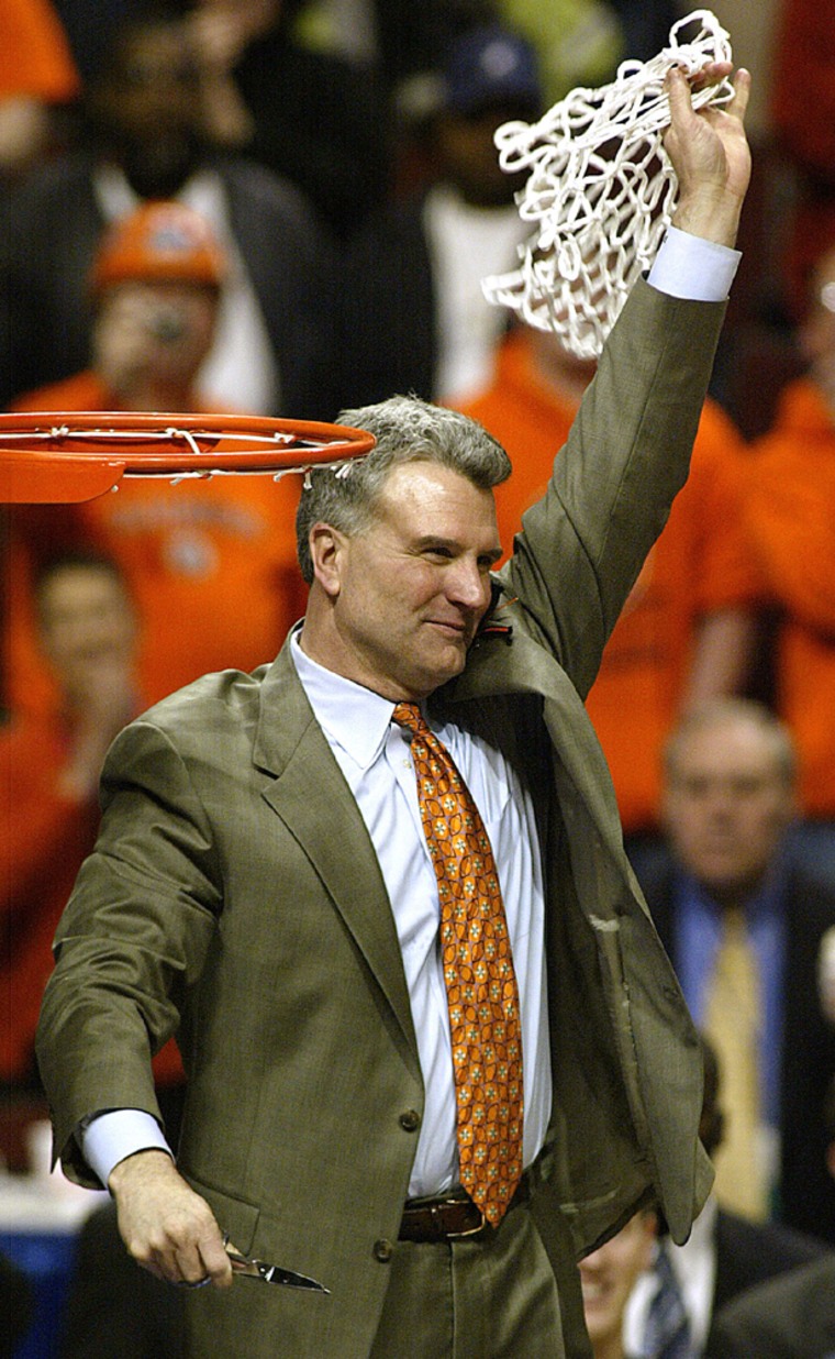 Illinois coach Weber waves to the crowd after winning the Big Ten Championship