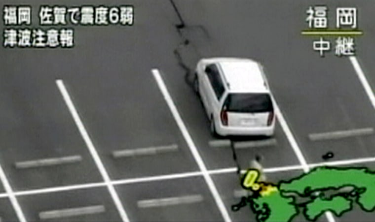Earthquake damage is shown in an image taken from a Japanese television broadcast.