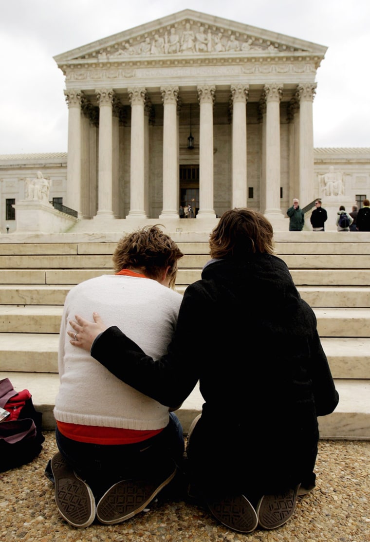 Pro life activists pray in front of the U.S. Supreme Court