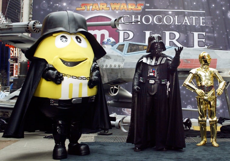 "M-Vader" is joined by "Star Wars" characters Darth Vader and C-3PO  as the new M&M's are unveiled in New York Tuesday.