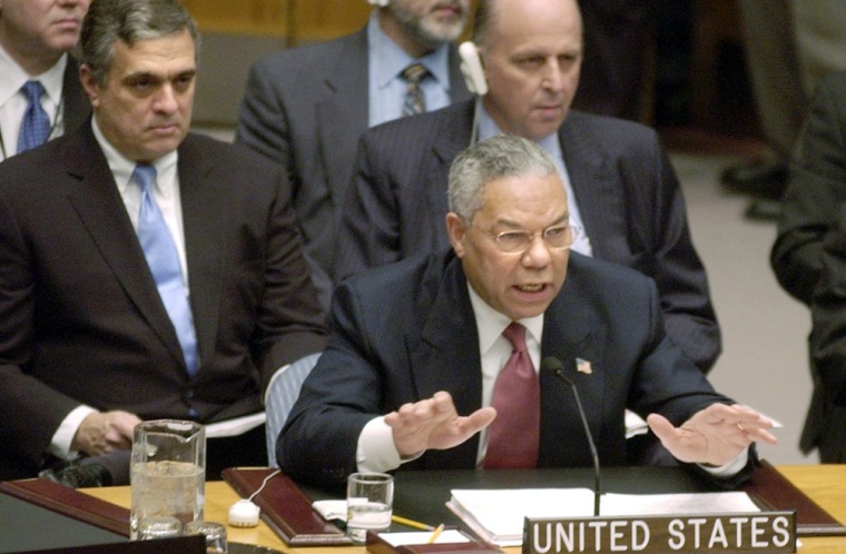 The faulty U.S. intelligence data cited in a new report was used in February 2003 by then Secretary of State Colin Powell to seek a United Nations endorsement for military action against Iraq. Behind Powell at right is John Negroponte, then U.N. ambassador and now the nominee to be director of national intelligence.
