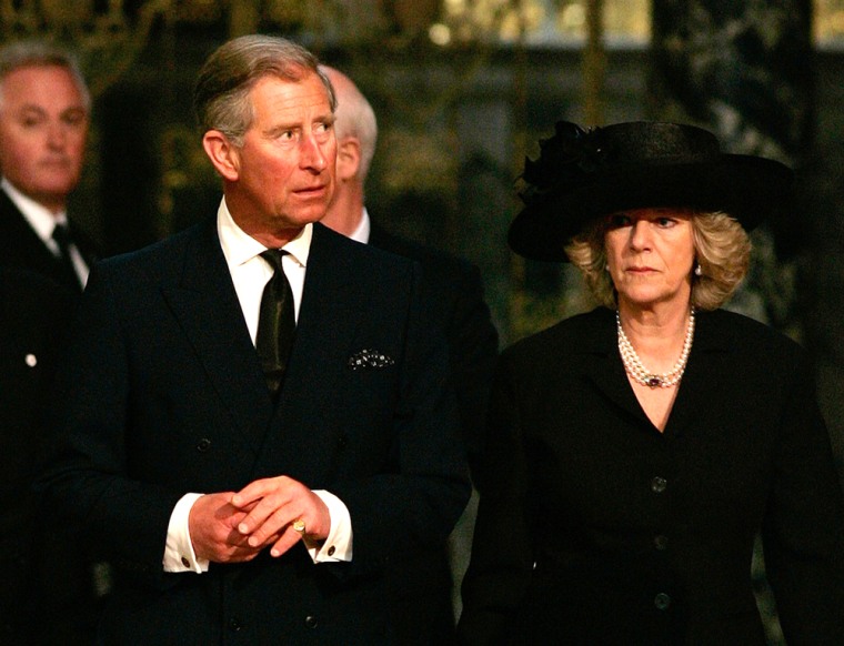 Prince Charles and Camilla Parker-Bowles attend a service in memory of Pope John Paul II at London's Westminster Cathedral