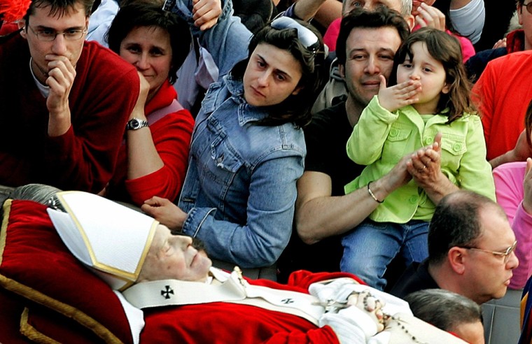 The body of the late Pope John Paul II is carried through Saint Peter's Square at the Vatican