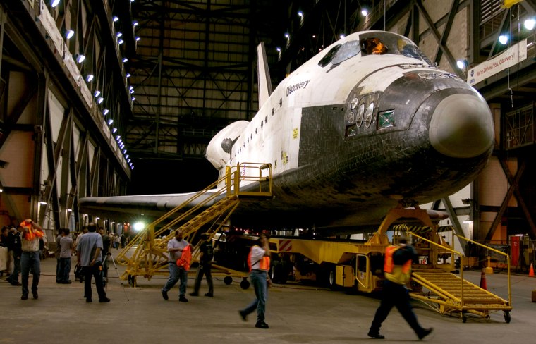 Space Shuttle Discovery Moves To VAB