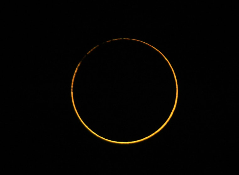 The moon passes between the earth and the sun to cause an annular eclipse as seen from in Venezuela