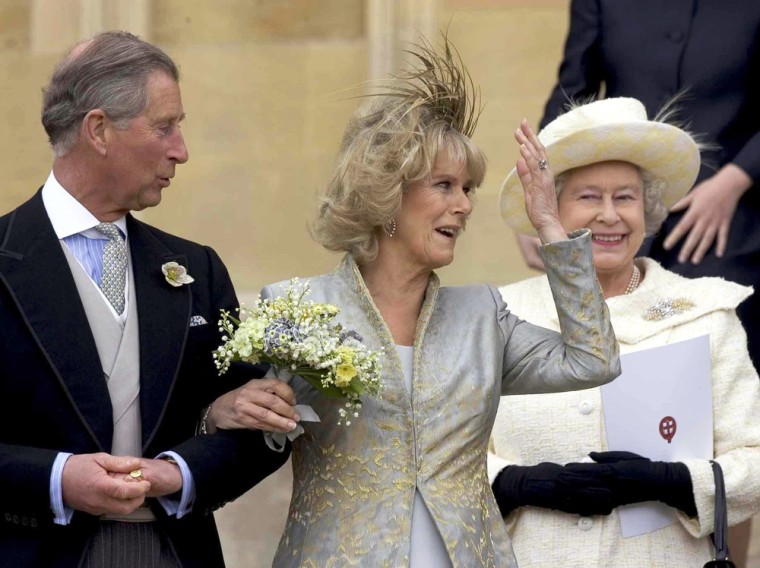 Britain's Prince Charles, and Camilla the Duchess of Cornwall, leave St George's Chapel, Windsor, Saturday April 9, 2005 as Britain's Queen Elizabeth II, right,  looks on following the blessing of their wedding.  (AP Photo/Bob Collier/pool)