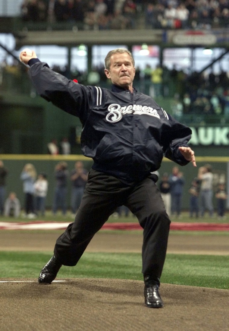 PRESIDENT GEORGE W BUSH THROWS OUT THE FIRST PITCH IN MILLER PARK