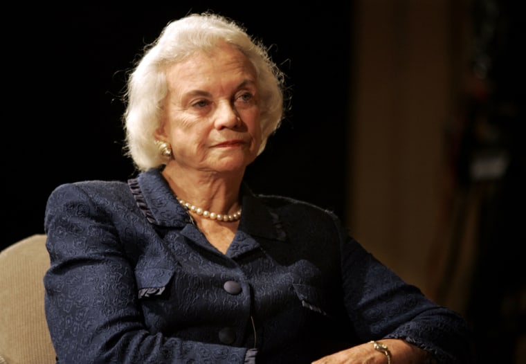 Supreme Court Justice Sandra Day O'Connor listens during Thursday night's appearance at the National Archives with fellow justices Antonin Scalia and Stephen Breyer.