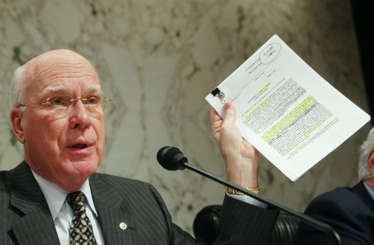 Senator Leahy waves White House memo written by Attorney General nominee Gonzales during Senate confirmation hearing