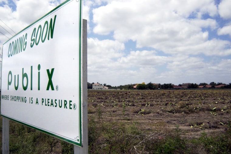 ** ADVANCE FOR WEEKEND OF APRIL 23-24 ** Farmed land is seen after it's been purchased to make way for a new grocery store in Homestead, Fla., Wednesday, April 7, 2005. Farmers and environmentalists fear for the land's future with housing developers are snapping up Miami-Dade County's dwindling open land in hopes of convincing local politicians to push the development line towards the threatened ``River of Grass'' to the west.(AP Photo/Yesikka Vivancos)